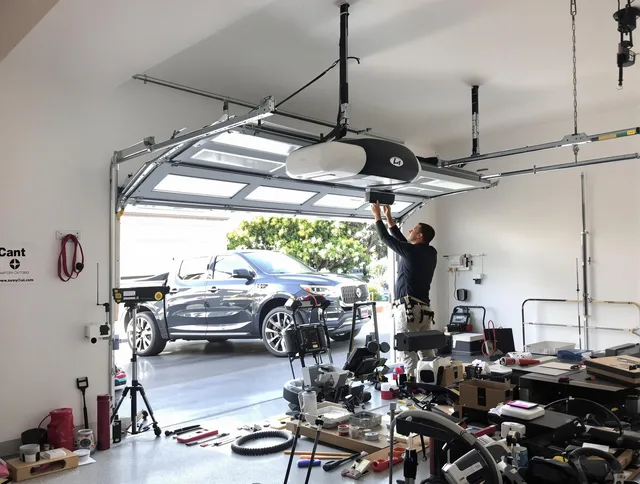 Compton Garage Door Repair specialist installing smart garage door opener system in Compton home