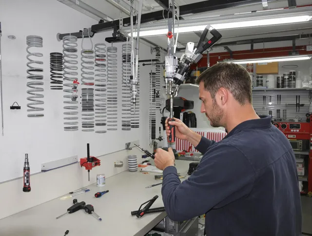 Compton Garage Door Repair safety certified technician performing precision spring replacement in Compton
