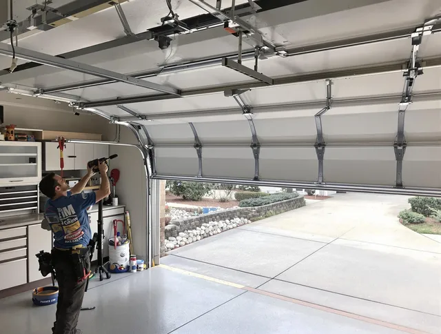 Garage door track repair service by Compton Garage Door Repair in Compton